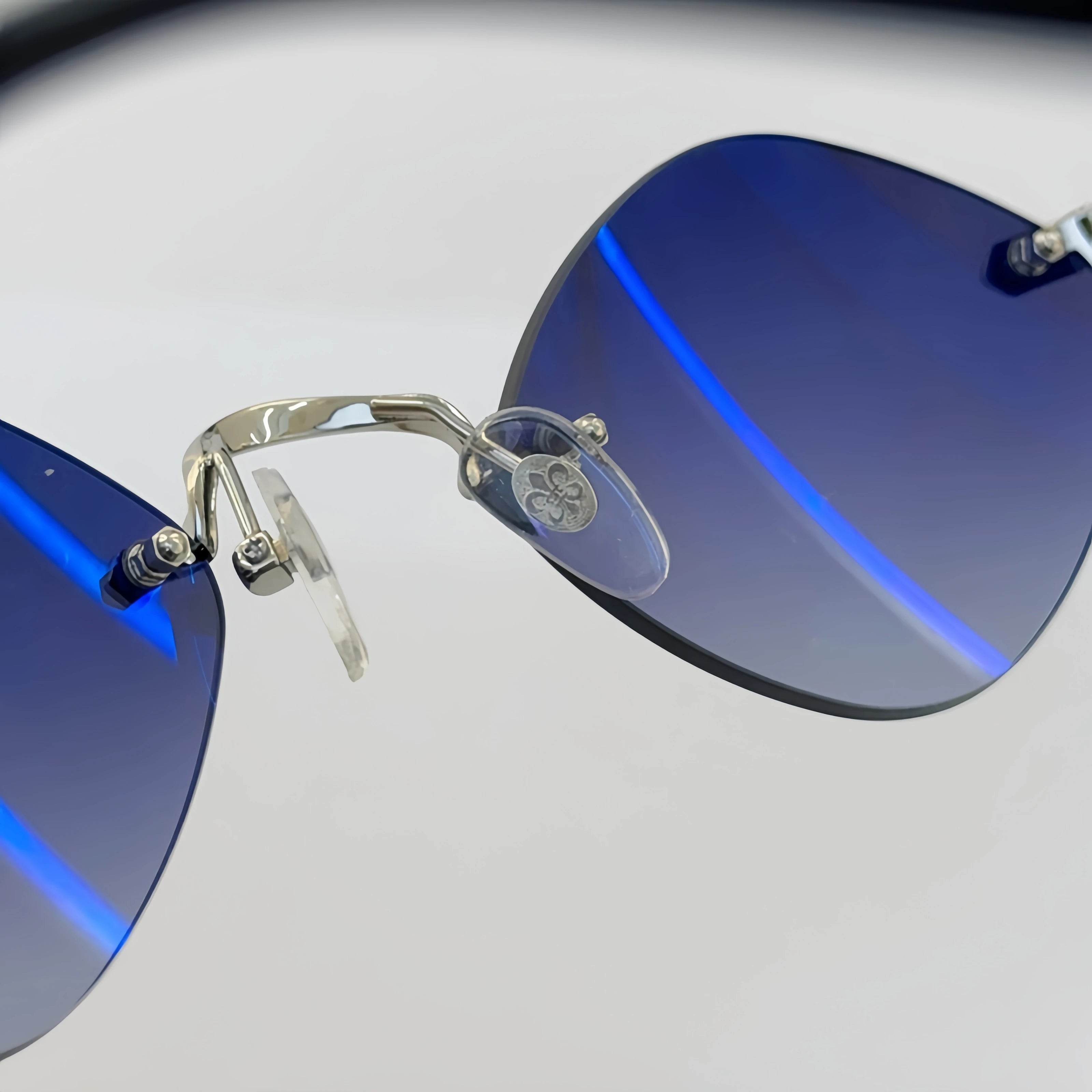 Summer Popular High Quality Fashion Brand Men and Women Sunglasses Classic Punk Outdoor Diamond Female Rimless Sun Glasses UV400